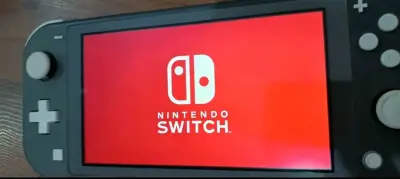 Nintendo Switch Lite gris nuevo - miniatura 6