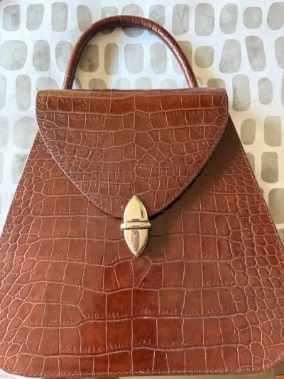 Cartera marrón con textura - miniatura 1