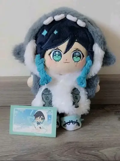Muñeco de peluche azul y gris - miniatura 1