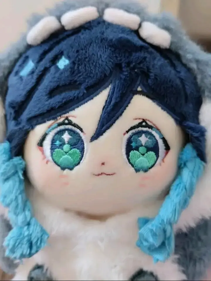 Muñeco de peluche azul y gris - 2