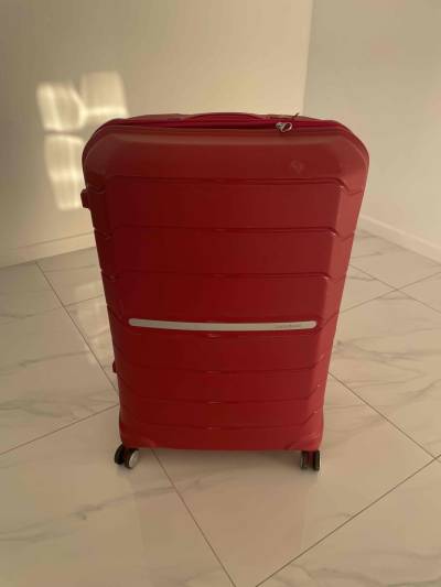 Maleta roja grande con ruedas - miniatura 1