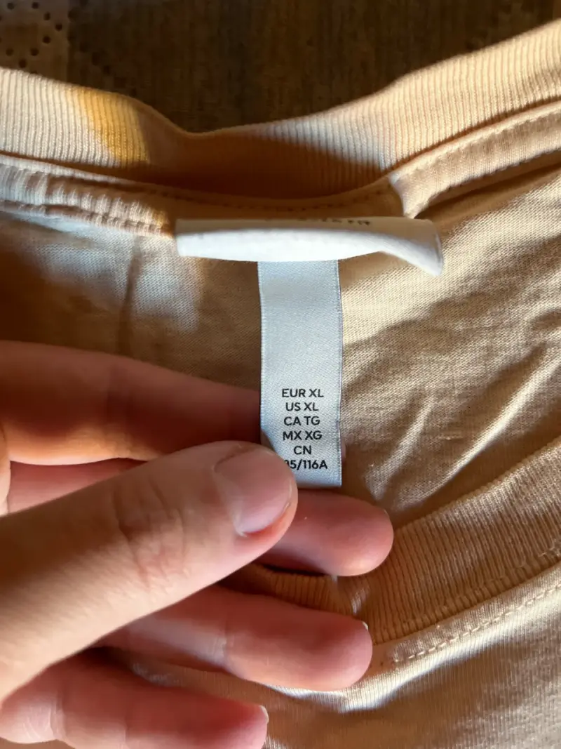 Polera beige con logo Solar Age - 2
