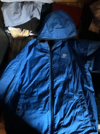 Chaqueta azul con capucha Nike - miniatura 1