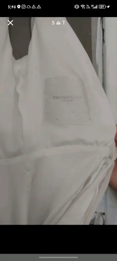 Vestido de novia blanco con pedrería - miniatura 3