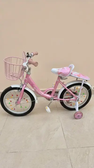 Bicicleta infantil rosada con canasto - miniatura 1