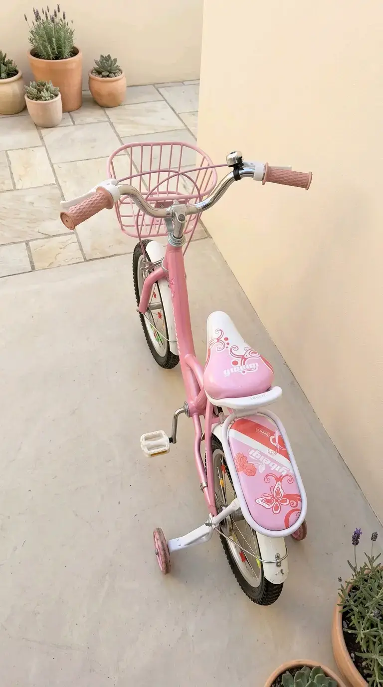 Bicicleta infantil rosada con canasto - 2