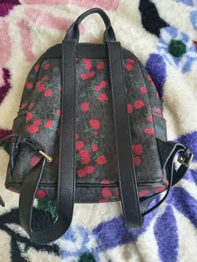 Mochila negra con rosas Michael Kors original - miniatura 1