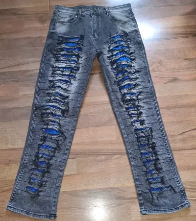 Jeans desgastados grises - miniatura 1