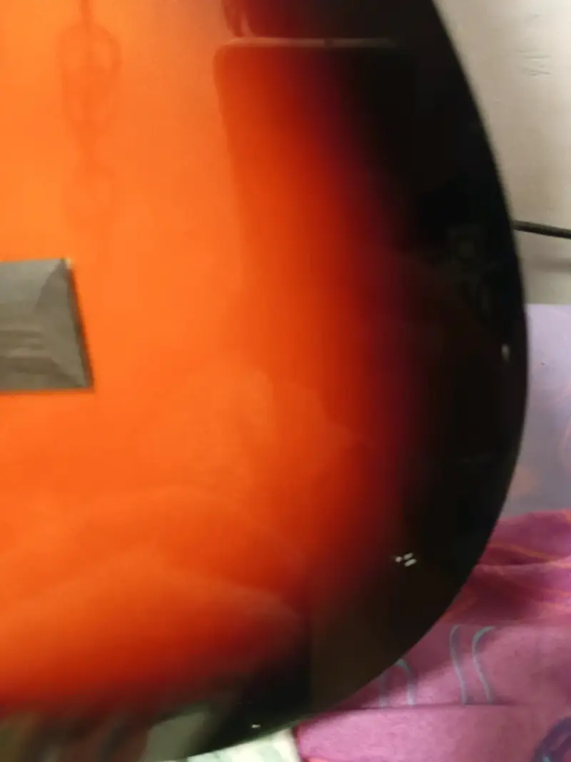 Guitarra clásica naranja y negra - 2