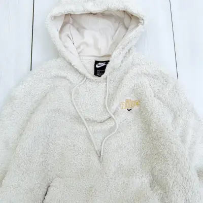 Peludito Nike Beige - miniatura 3