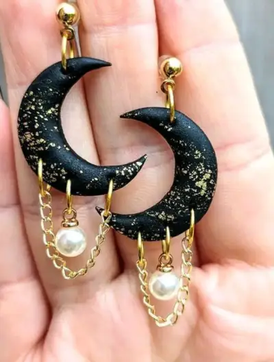 Aros de luna en negro y dorado - miniatura 1