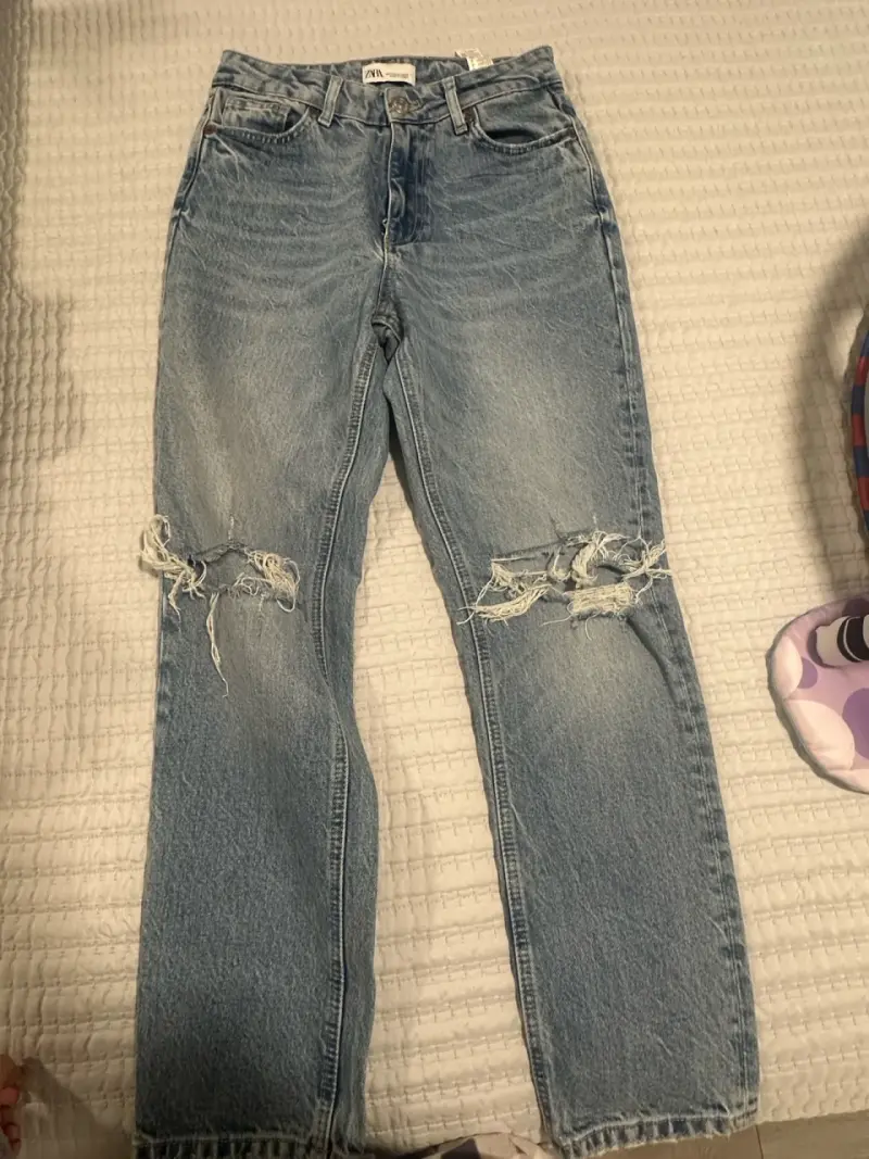 Jeans rasgados azules - 1