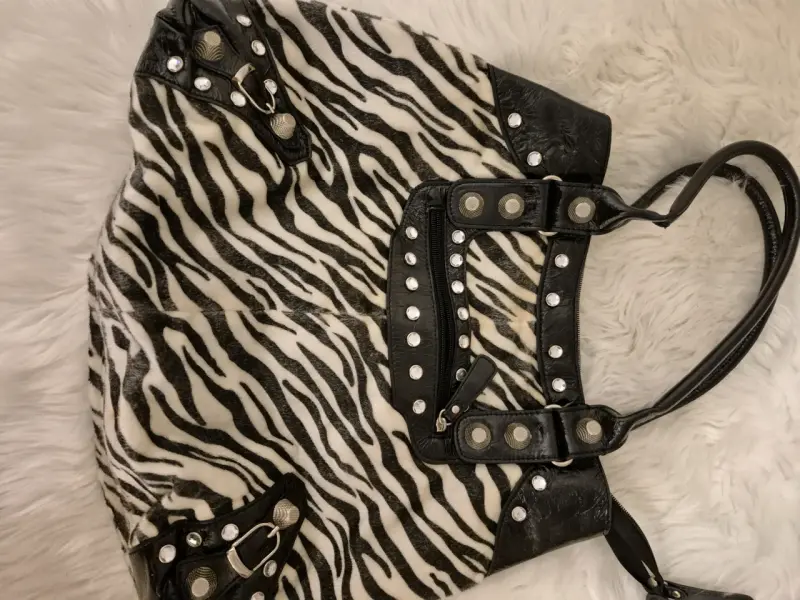 Cartera animal print con tachas - 1