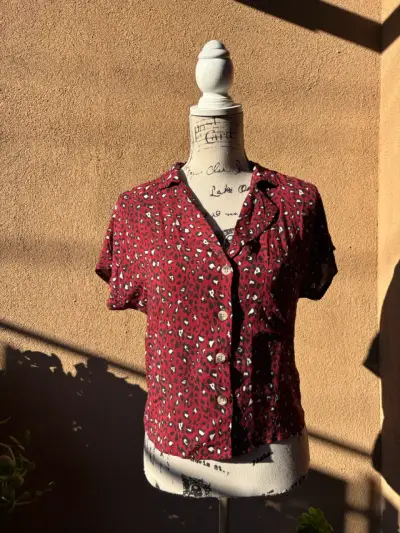 Blusa roja estampado leopardo - miniatura 1