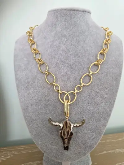 Collar dorado con colgante colección criaturas - miniatura 1