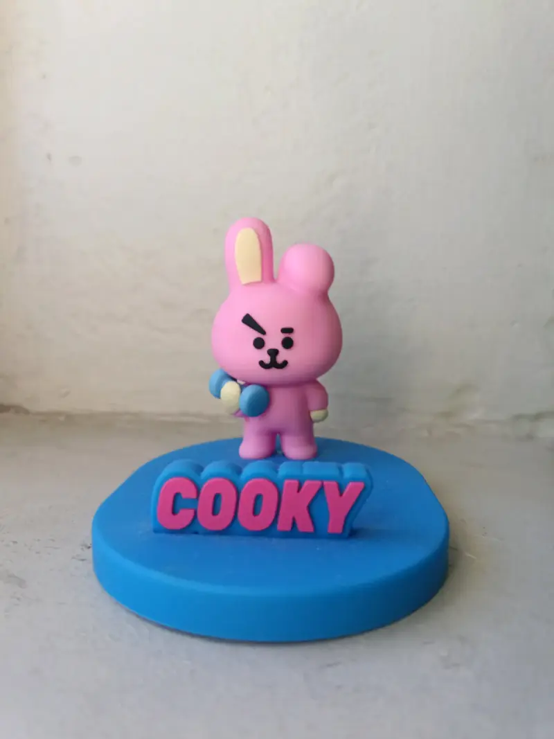 Figura BT21 Cooky soporte de celular - 1
