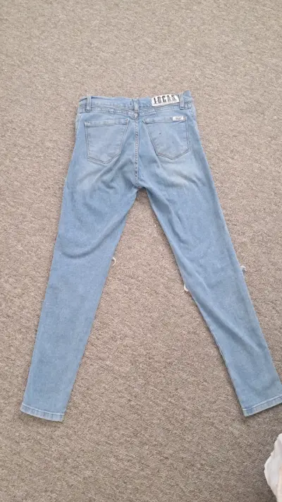 Jeans azul rasgados - miniatura 2