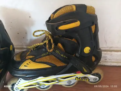 Patines en línea amarillos y negros - miniatura 1
