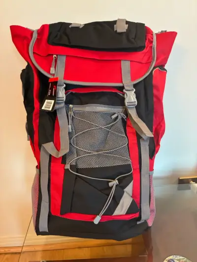 Mochila de trekking roja y negra - miniatura 1