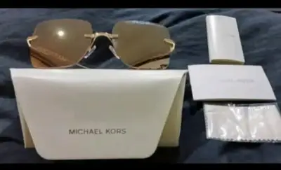 Lentes de sol Michael Kors dorados - miniatura 1