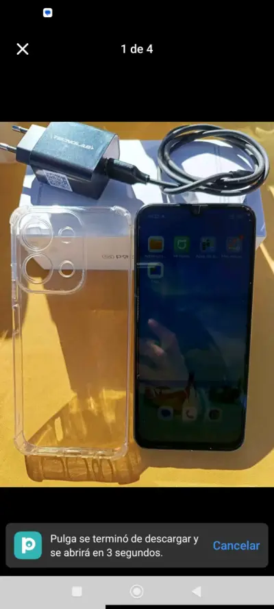 Smartphone con cargador y funda - miniatura 1