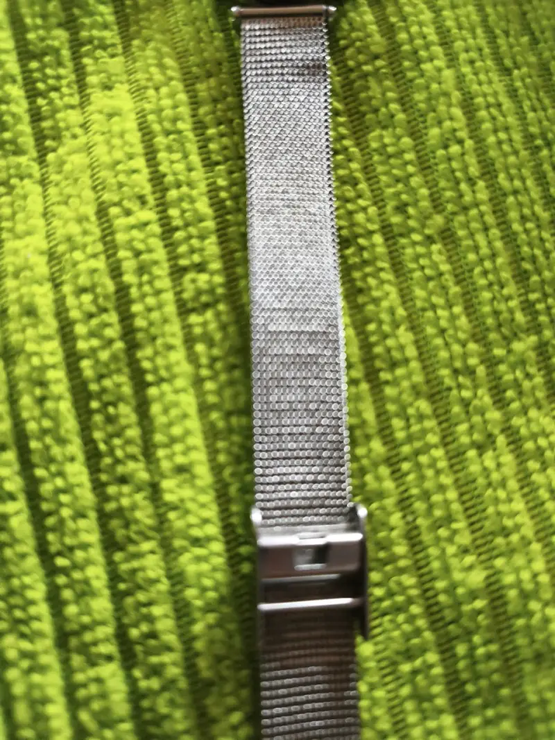 Reloj plateado con corazón - 2