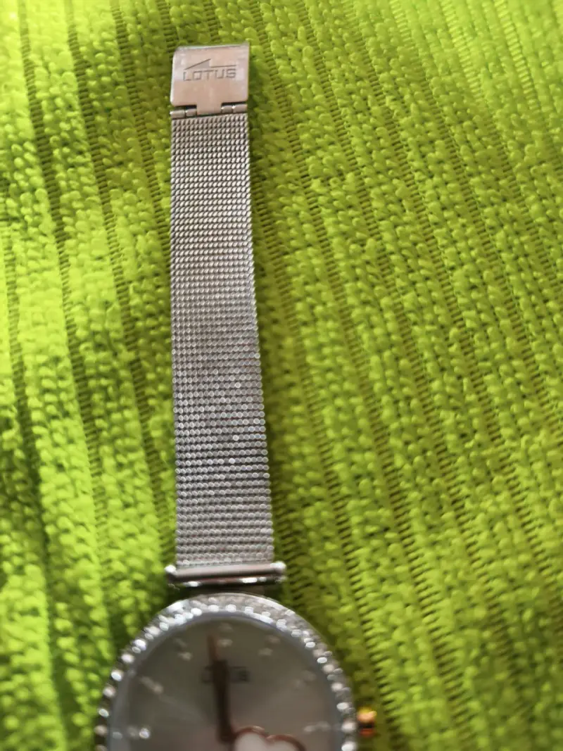 Reloj plateado con corazón - 3