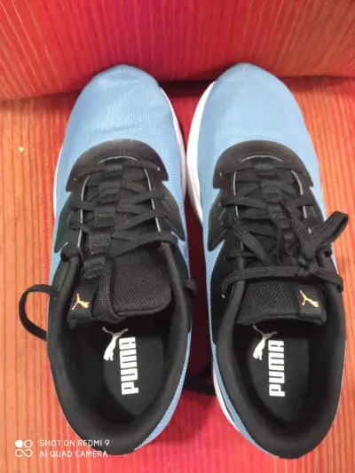 Zapatillas deportivas Puma celestes - miniatura 1