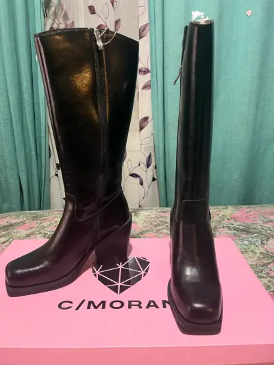 Botas negras de cuero con taco - miniatura 1