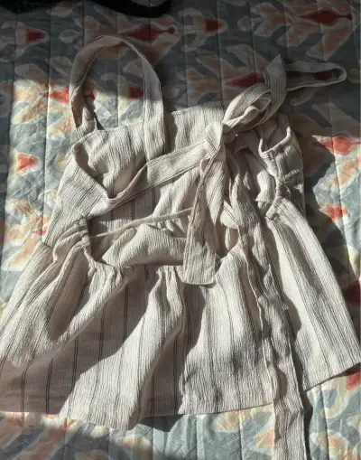 Blusa sin mangas beige a rayas - miniatura 2