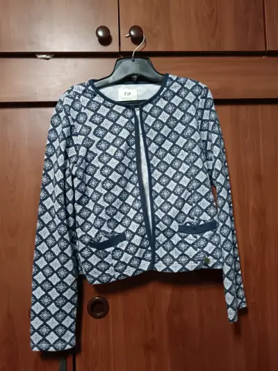 Chaqueta azul con patrón geométrico - miniatura 1