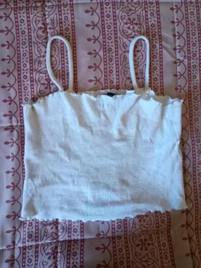 Polera blanca sin mangas - miniatura 1