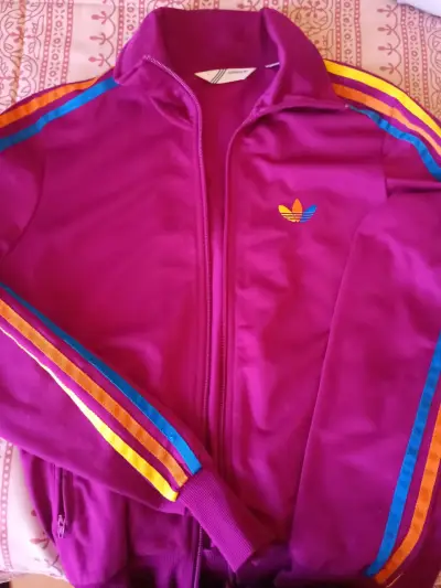 Chaqueta deportiva morada con rayas - miniatura 1