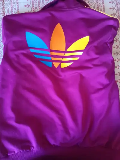 Chaqueta deportiva morada con rayas - miniatura 2