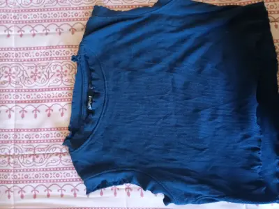 Polera azul sin mangas - miniatura 1
