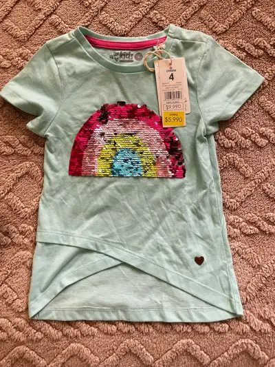 Polera turquesa con lentejuelas arcoiris - miniatura 1