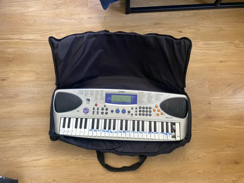 Teclado Casio MA-150 con funda