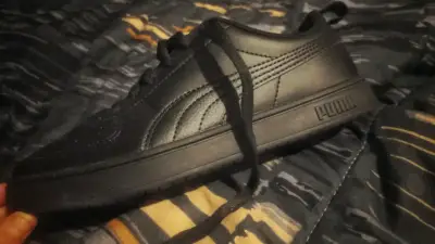 Zapatillas deportivas negras Puma - miniatura 1