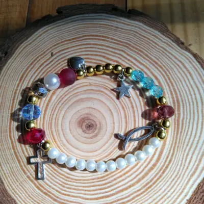 Pulsera multicolor con dijes - miniatura 1