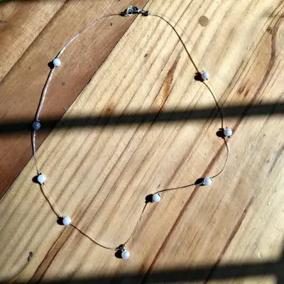 Collar de hilo con perlas - miniatura 1