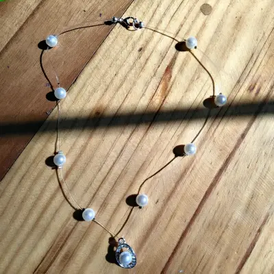 Collar de hilo con perlas - miniatura 2
