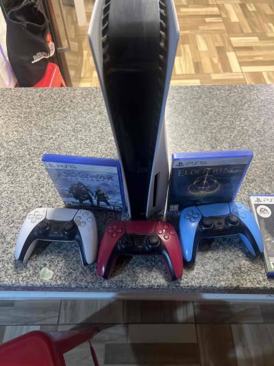 Consola PS5 con accesorios y juegos - miniatura 1
