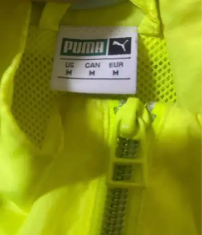 Chaqueta deportiva amarilla Puma - miniatura 2