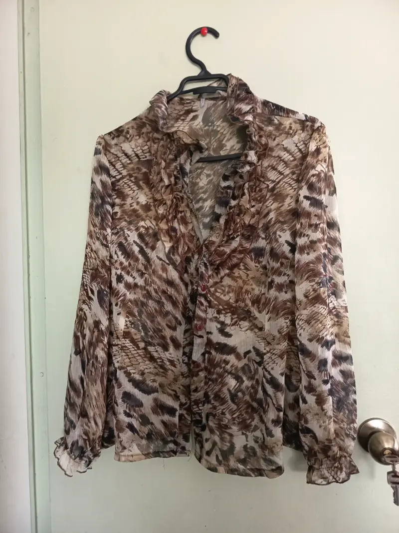 Blusa transparente animal print