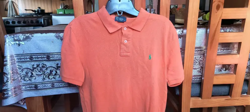 Polera polo naranja