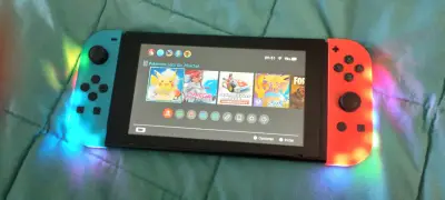 Consola Nintendo Switch con luces LED - miniatura 1