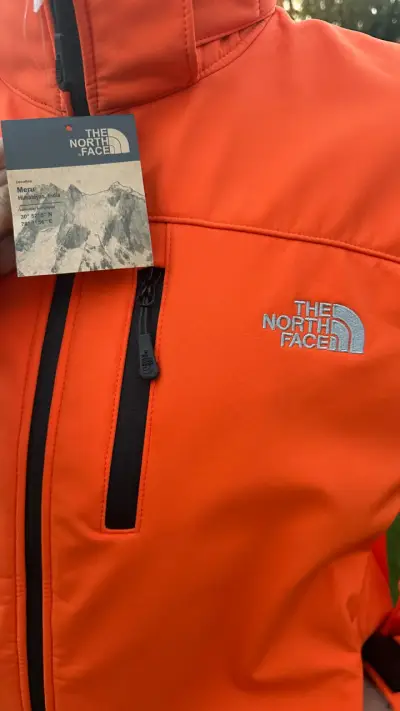 Chaqueta naranja impermeable northface - miniatura 3