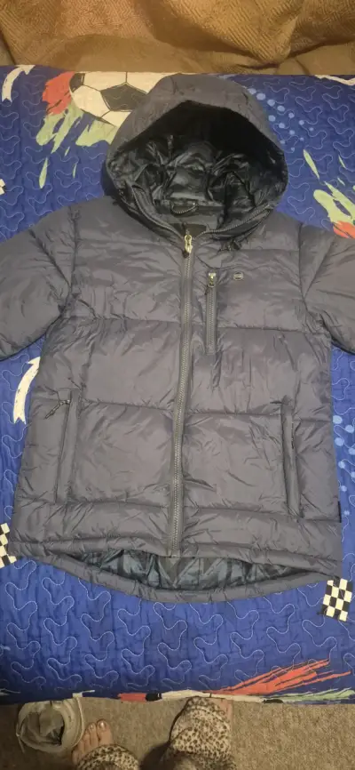 Chaqueta acolchada azul con capucha - miniatura 1