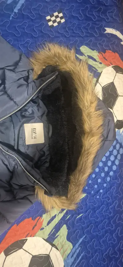 Parka azul con capucha de pelo - miniatura 3