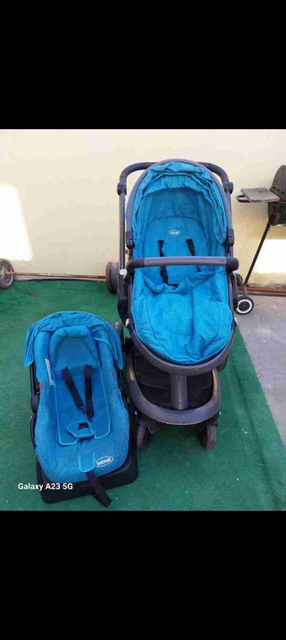 Coche de bebé azul con silla - 2